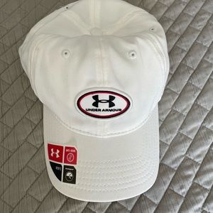 Under Amour  NWT men’s white hat. L Adjustable. Small dirt spot (see pictures)
